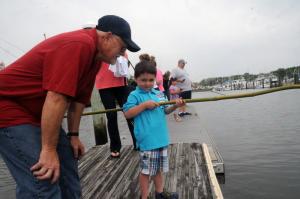 Sherman Newton gives some helpful advice to his grandson Shane Vandervort. BY STEVEN BILLUPS