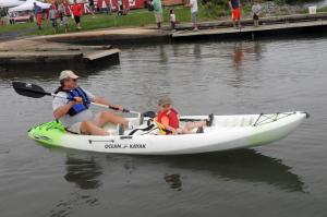 Taking a ride on a Quest kayak are Bentley Cortazzo, right, and John Bordlemay from Lewes. BY STEVEN BILLUPS