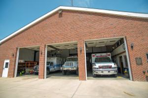 The former airplane hanger is now an outer building used for engines. BY DENY HOWETH