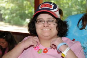 Beth Fuhs models her necklace made during arts and crafts. BY DAN COOK