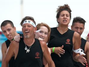 Cultured Pearl's team offers support to a teammate, (l-r) Georgi Radkov, John Smar, Gailyn Neutzling, Neda Atanasova and Simi Bogdan. BY DENY HOWETH