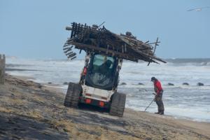 Most of the destroyed fencing had been removed from Rehoboth Beach by the middle of the day on Monday. BY RON MACARTHUR
