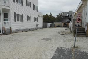The proposal is to turn this driveway into 11 parking spaces. BY CHRIS FLOOD