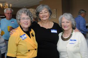 There were a lot of attendees wearing the Golden Knights colors at the reunion. Proudly wearing the yellow and black is (l-r) Rosalie Betts Walls, class of '52; with Mary Ellen Carey, class of '53; and Barbara Wheatley Smith. BY STEVEN BILLUPS