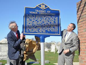 Jim Morrison, left, and Sen. Ernie Lopez unveil the new historic marker at the entrance to the Bethel Cemetery in Lewes. BY NICK ROTH