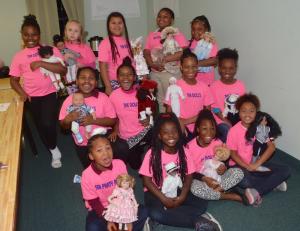 Some of the members of the Dolls Tea program gather for a meeting. They are (l-r) in the back row, Timia Gibbs, Lacey Pearson, Timia Rossi, Jasmine Neal and Skye Walker; middle row, I’nai Sterile, Treasure Perkins, Aaliyah Tilghman and Shamaya Brown; and front row, Ariyah Johnson, Ca’Sanyah Parker Upshur, Jayla Bowden and Za’niah Tunnell. BY RON MACARTHUR