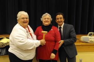 AARP Past President Pat Rust passes the gavel to new President Pat Moore. Shown are (l-r) Rust, Moore and Carlos de los Ramos. SOURCE SUBMITTED