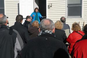Primeros Pasos Board President Sandra Baker speaks to the large crowd of local citizens, volunteers and state and local officials prior to the groundbreaking. BY STEVEN BILLUPS