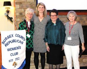 Gathering in front of the Kings Creek Country Club fireplace are (l-r) Outgoing Recording Secretary Jan Stevenson, Immediate Past President and Interim First Vice President Alana Keeley, President Cathy Watts and Treasurer Sally Duveneck.