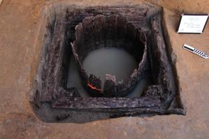 The staves and bands are visible on this 17th century barrel constructed well uncovered in 2015. SOURCE SUBMITTED