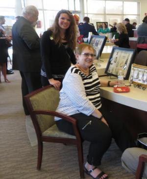 Local artists Jen Zezenski, left, and Mary Lee Groton show their work at the WSFS community fundraiser in Millsboro. BY MOLLY MACMILLAN