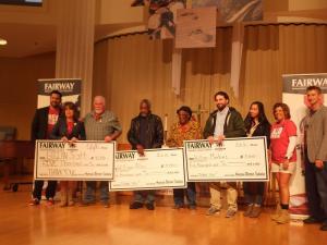 The American Warrior Initiative gave three local veterans $5,000 to help with home ownership. Presenting the awards are (l-r) Sean Parnell, Louise Thaxton, Brian Scott, William Allen, Marian Smith, William Meekins, Helena Pappagianis, Kim Grim and Ben Lunak. BY RYAN MAVITY