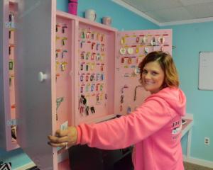 Dust n Time owner Jennfier Kellogg has dozens of keys available for her commercial and residential customers. BY RON MACARTHUR