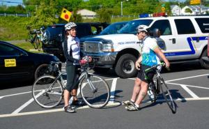 Elaine Dernoga of Milton and Andrew Shea of Boston are ready for the next leg of their ride. BY RON MACARTHUR