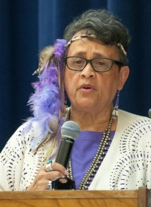 Ladies Luncheon committee member Bonnie Spencer welcomes the community. BY DENY HOWETH