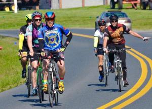 Some of the first cyclists to finish in Lewes head to Station 2 off Route 1. They are, from left front to back, Derek Collins, Chris Green and David Wheaton, and right front to back, Mark Dobson and Carl Surprenant. BY RON MACARTHUR