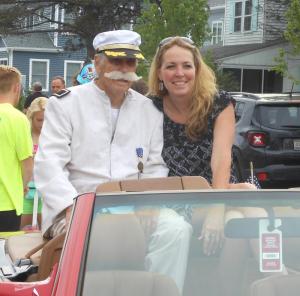 Tom Creekmore, a 92-year-old from Long Neck, and Dewey Business Partnership’s Diane Austin smile before the parade begins. CHRIS FLOOD PHOTO
