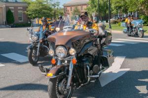 Buffalo Soldiers Motor Club of Delaware lead the parade around The Circle in Georgetown as they head to the Richard Allen School.