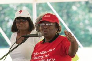 The Rev. Dr. Geraldine Jones, president of Delta Sigma Theta Sorority, talks to the crowd about remembering the past and embracing the future.