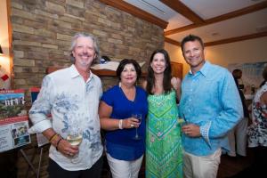 Bruce and Adriana Wilson, left, pose with Dana and Peter Luzak.