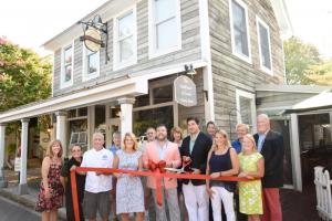 Lower Shore Restaurant Group recently held a ribbon cutting at The Gate House of Lewes on Market Street. Shown are (l-r) Trish Kotyk, Delaware Today; Patti Lebo, server; Jeff Weldon, chef; Bonnie Osler, Lewes city council; Megan Shaw; Fred Beaufait, Lewes deputy mayor; Wilson Gates, owner and chef LSRG; Betsy Reamer, Lewes Chamber of Commerce; Brenden Shaw, owner and chef LSRG; Anne Keoush, Delaware Today; Stephanie Gates; Rob Morgan, Lewes city council; Gretchen Gates; and Chip Gates. NICK ROTH PHOTO