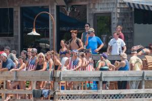 Spectators watch as teams compete.