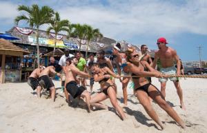 Team Que Pasa gives it their all in the tug of war.