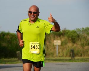Dr. Uday Jani of Lewes finishes the 10-miler. DAVE FREDERICK PHOTO