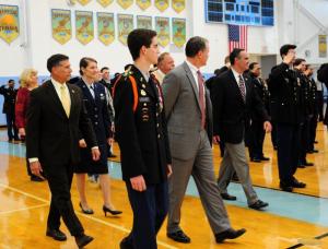 Cadet Lt. Col. David Collord leads a contingent of dignitaries as they inspect the JROTC cadets. Shown are (l-r) Rep. Steve Smyk, Veteran Amie King, Collard, Veteran Paul Rogers, Superintendent Bob Fulton and Sen. Ernie Lopez. DAN COOK PHOTO