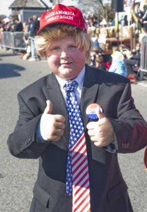 Gus McClay of Boothwyn, Pa., works the crowd as Donald Trump.