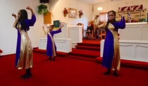 God’s Angels of Victory provide a praise dance during the service.