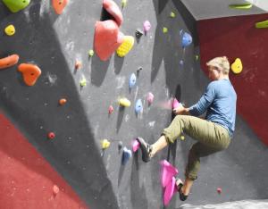 Chris Way demonstrates just how difficult the bouldering wall can be at RISE. NICK ROTH PHOTO