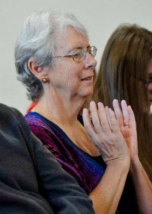 Claire O’Meara gives thoughtful prayer during the service at Christ’s Church.