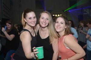 Toasting to the Shrimp Feast are Christy Nagle, Alexis Blaxeslee and Morgan Mariner from Milton. Shrimp Feast