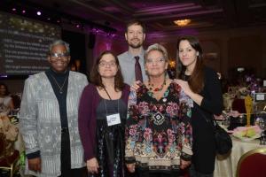 Georgetown residents show their support of Tina Myers, a two-year breast cancer survivor. Myers was a model in the fashion show. Shown are (l-r) Camilla Carter, Kristina Frost, James Clement, Myers and Samantha Bransfield. DBCC