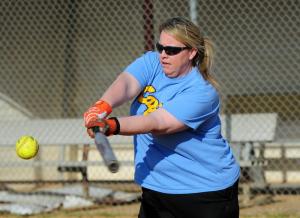 New Cape coach Shannon Timmons hits infield practice. DAN COOK PHOTO