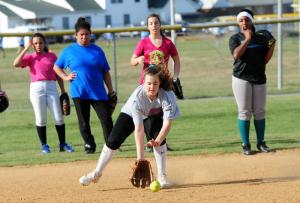 Cape freshman Rye Elliott scoops up a grounder during an infield drill. DAN COOK PHOTO