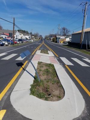 A motorist recently mowed down two signs in the island. SUBMITTED PHOTO