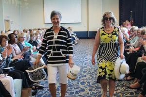 Fund for Women founders Sandy Roberts and Bonnie Johnson model outfits from Twila Farrell of Lewes. SUBMITTED PHOTO