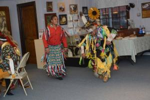Grass Dancers Matthew Harmon, left and Lenny Harmon perform after a explanation of the history of the dance. GMAL
