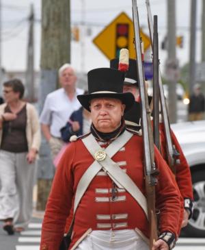 Tom Russell leads the No. 1 Company Second Battalion Royal Marines to the Zwaanendael Museum. NICK ROTH PHOTO