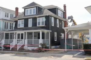 The demolition crew takes a bite of the 1917 Four Square-style house on Rehoboth’s Brooklyn Avenue demolished a few months ago. The house for many years was home to Melbourne Rooms and Apartments. DENNIS FORNEY PHOTO