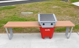 Smart benches offer USB ports for riders to charge their phones while waiting for the bus. NICK ROTH PHOTO