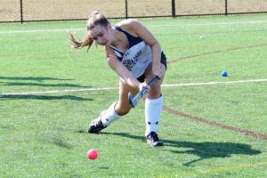 Camper Holly McNeilly takes a drive during a passing drill.