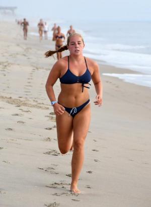Allison Thomas finishes the 0.8-mile run.