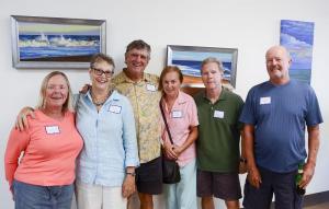 Georgia Tugend, Helen Waite, John Feliciani, Margaret Wiebe, Mark Foglietta and Dave Fischbach gather along the gallery wall for a photo.