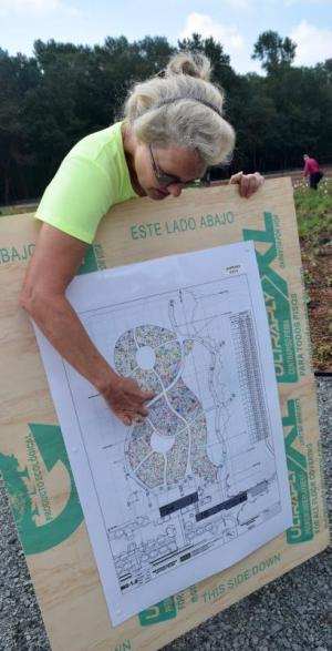 Landscape designer Barbara Katz shows off the design concept for the meadow.