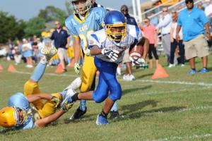 Timmy Scott of Georgetown spins for a touchdown.