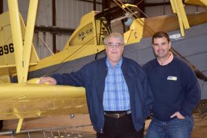 Allen Chorman, left, joins his son, Jeff, who has taken over the aerial application business. MADDY LAURIA PHOTO