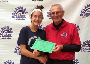 Delaware Shore Executive Director Mike Eisenhour, right, presents the 2017 Hockey for Haxton Scholarship to Elizabeth “Lizzie” Soucy. SUBMITTED PHOTO